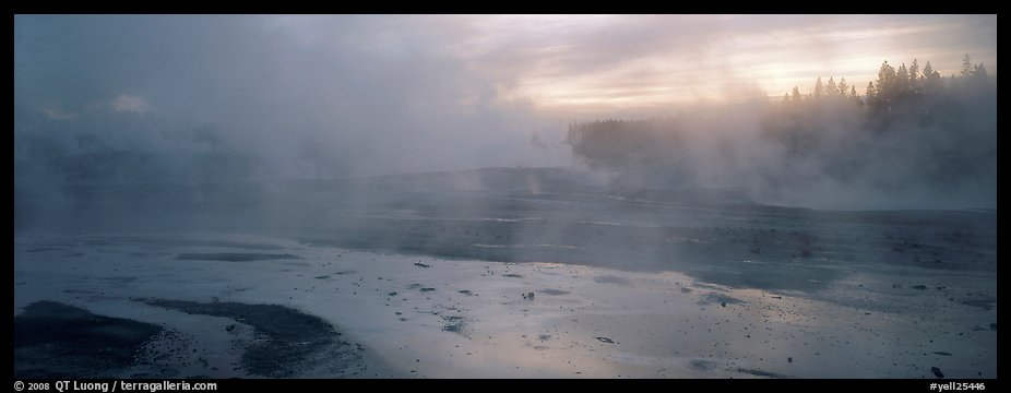 Steam rising in thermal geyser basin a dawn. Yellowstone National Park (color)