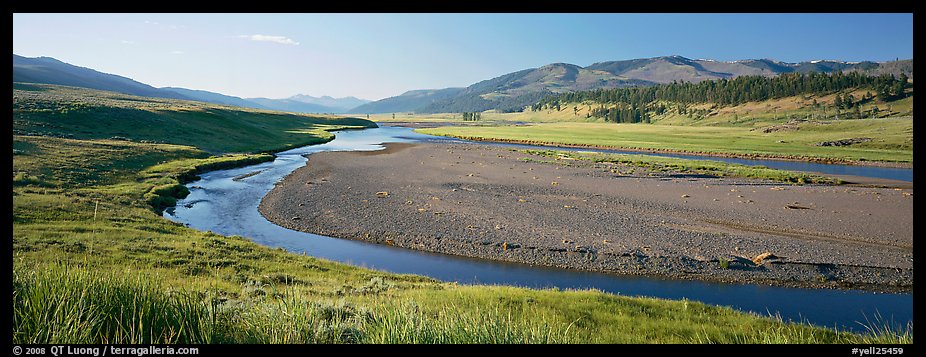 Wide valley and stream in summer. Yellowstone National Park, Wyoming, USA.