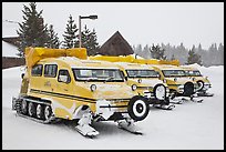 Snow coaches parked at Flagg Ranch. Yellowstone National Park, Wyoming, USA.