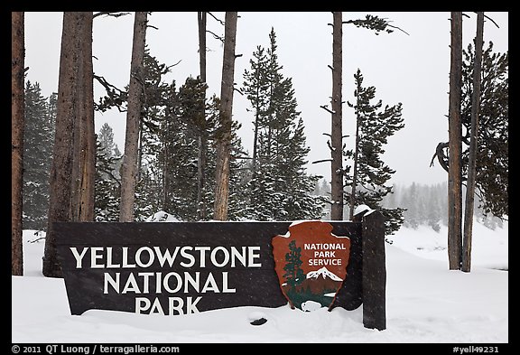 Park entrance sign in winter. Yellowstone National Park, Wyoming, USA.