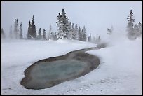 Thermal pool in winter, West Thumb Geyser Basin. Yellowstone National Park, Wyoming, USA.