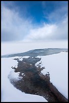 Thermal stream at edge of Yellowstone Lake in winter. Yellowstone National Park, Wyoming, USA.