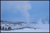 Old Faithful geyser plume in winter. Yellowstone National Park, Wyoming, USA.