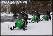 Snowmobile riders. Yellowstone National Park, Wyoming, USA.