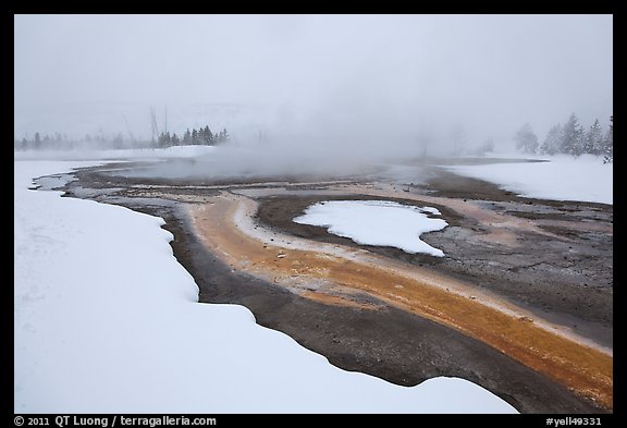 Mirror Pool, snow and steam. Yellowstone National Park, Wyoming, USA.