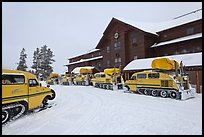 Winter Snowcoaches in front of Old Faithful Snow Lodge. Yellowstone National Park, Wyoming, USA.