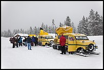 Winter tour snow coaches unloading, Flagg Ranch. Yellowstone National Park, Wyoming, USA.