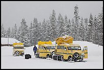 Snowcoaches and snow falling. Yellowstone National Park, Wyoming, USA.