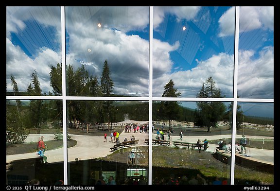 Old Faithful Geyser, Old Faithful visitor education center window reflexion. Yellowstone National Park (color)