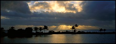 Sunrise with dark clouds over coastal lagoon. Biscayne National Park (Panoramic color)