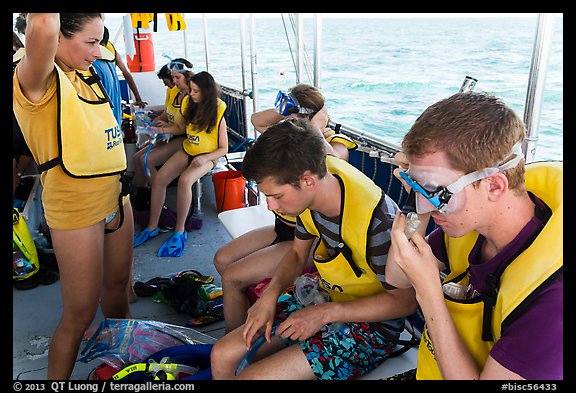 Snorklers getting ready on boat. Biscayne National Park, Florida, USA.