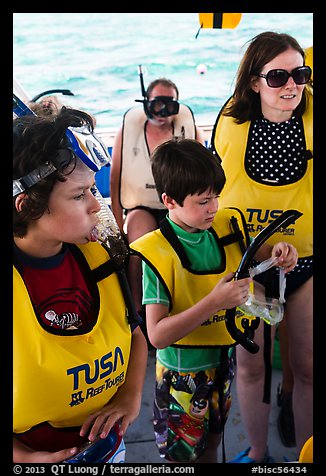 Family preparing for snorkeling. Biscayne National Park, Florida, USA.