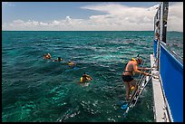 Snorkeling boat, snorklers and reef. Biscayne National Park, Florida, USA. (color)