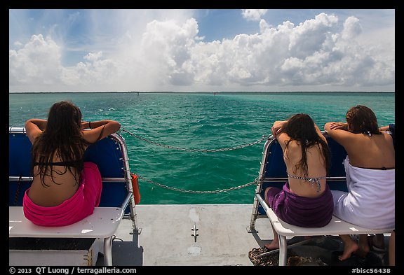 Women sunning themselves on snorkeling boat. Biscayne National Park (color)