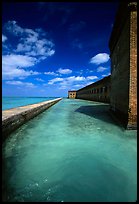 Fort Jefferson moat and massive brick wall on a sunny dayl. Dry Tortugas National Park, Florida, USA.