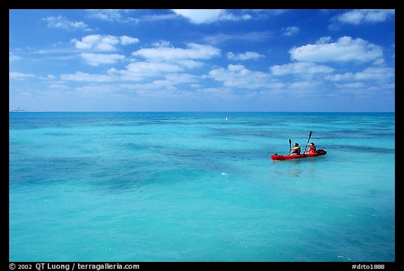 Sea kayakers in turquoise waters. Dry Tortugas National Park, Florida, USA.