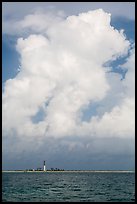 Loggerhead key and lighthouse and tropical cloud. Dry Tortugas National Park, Florida, USA. (color)