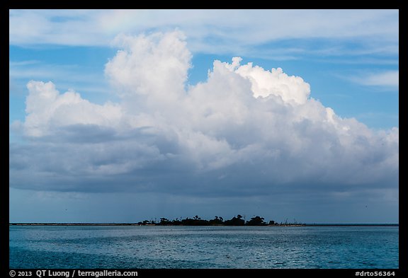 Vegetation-covered Long Key below tropical cloud. Dry Tortugas National Park, Florida, USA.