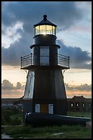 Harbor Light and gun at sunset. Dry Tortugas National Park, Florida, USA.