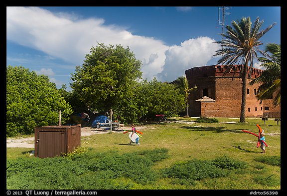 Children walking in campground. Dry Tortugas National Park (color)