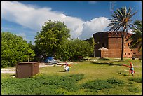 Children walking in campground. Dry Tortugas National Park, Florida, USA. (color)