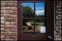 Fort Jefferson courtyard, visitor center window reflexion. Dry Tortugas National Park, Florida, USA. (color)