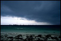 Approaching storm over Yachts at Tortugas anchorage. Dry Tortugas National Park, Florida, USA. (color)