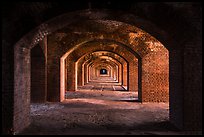 Gallery illuminated by last light inside Fort Jefferson. Dry Tortugas National Park, Florida, USA. (color)