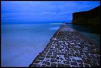 Brick seawall at dusk during a storm. Dry Tortugas National Park, Florida, USA.