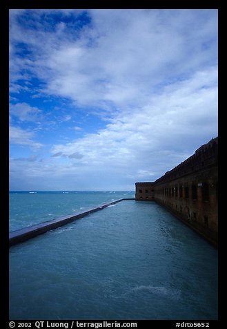 Sky, seawall and moat on windy day. Dry Tortugas National Park, Florida, USA.