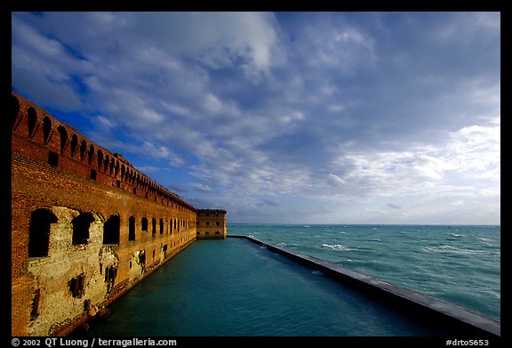 Fort Jefferson seawall and moat, late afternoon. Dry Tortugas National Park, Florida, USA.