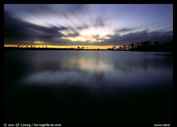 Dusk at Pine Glades Lake, with blured water and clouds. Everglades National Park (color)