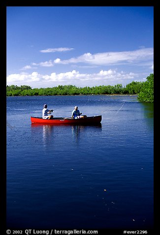 Fishing from a red canoe. Everglades National Park, Florida, USA.