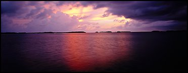 Stormy sunset over bay with low islets in background. Everglades National Park (Panoramic color)