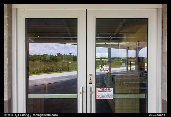 Road and slough, Shark Valley visitor center window reflexion. Everglades National Park (color)