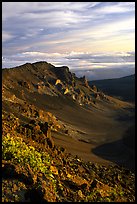 Crater rim and clouds  at sunrise. Haleakala National Park, Hawaii, USA.