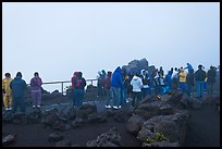 Tourists waiting for sunrise. Haleakala National Park, Hawaii, USA.