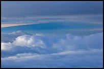 Mauna Loa between clouds, seen from Halekala summit. Haleakala National Park, Hawaii, USA. (color)
