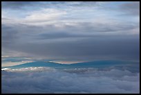 Mauna Kea and Mauna Loa between clouds. Haleakala National Park, Hawaii, USA.