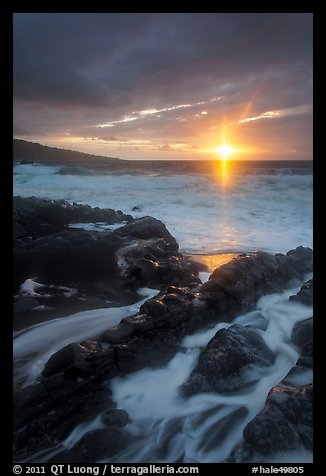 Sunrise over stormy ocean. Haleakala National Park, Hawaii, USA.