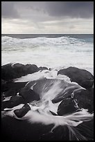 Surf, rocks, ocean and clouds. Haleakala National Park, Hawaii, USA. (color)