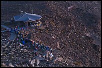 Visitor center and sunrise watchers at dawn. Haleakala National Park, Hawaii, USA.