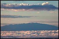 Mauna Kea and clouds at sunrise. Haleakala National Park, Hawaii, USA. (color)