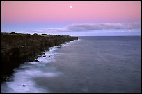 Holei Pali cliffs and moon at dusk. Hawaii Volcanoes National Park, Hawaii, USA.