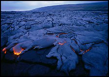 Field of lava flowing at dusk near end of Chain of Craters road. Hawaii Volcanoes National Park, Hawaii, USA. (color)