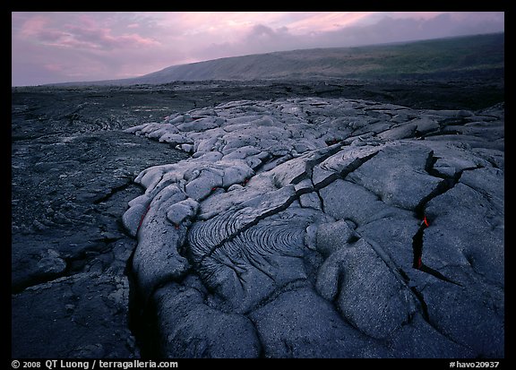 Fresh lava with cracks showing molten lava underneath. Hawaii Volcanoes National Park, Hawaii, USA.