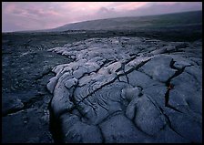 Fresh lava with cracks showing molten lava underneath. Hawaii Volcanoes National Park, Hawaii, USA.