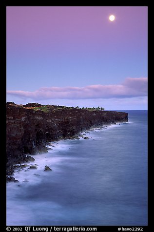 Holei Pali volcanic cliffs and moon at dusk. Hawaii Volcanoes National Park, Hawaii, USA.