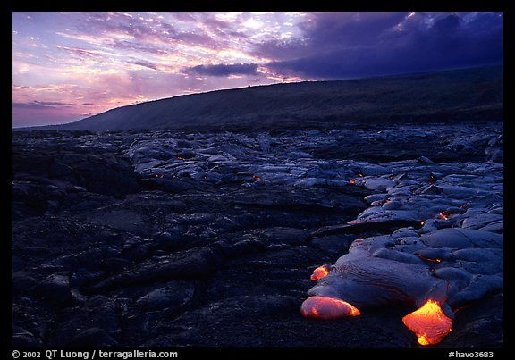Live lava advancing at sunset. Hawaii Volcanoes National Park, Hawaii, USA.