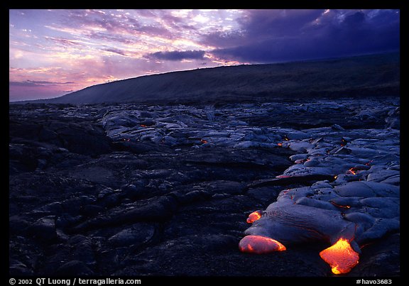 Live lava advancing at sunset. Hawaii Volcanoes National Park, Hawaii, USA.